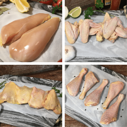 Raw pasture raised chicken breasts, wings, thighs and legs.