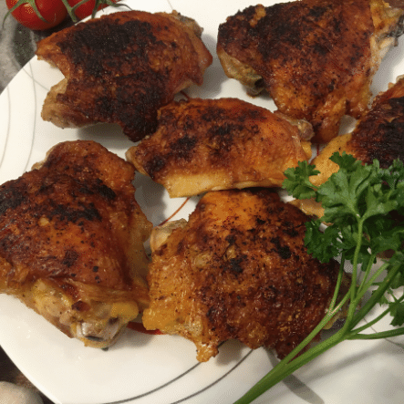 Pan fried chicken thighs.