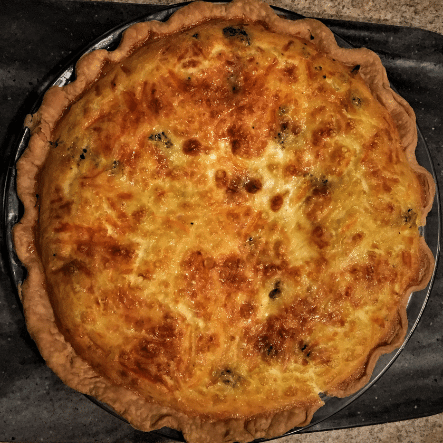 Golden quiche made with pasture-raised eggs.