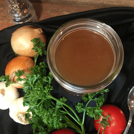 Homemade chicken broth made with pasture raised chicken frames.